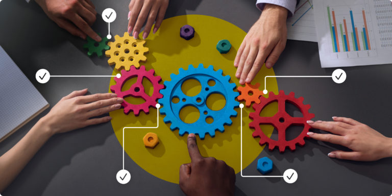 hands pointing to different cogs for integrated project management