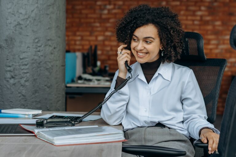 woman on the phone making a sales call